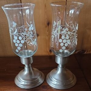 Genuine Pewter Weightef Canleticks With Engraved Gladd Globes.